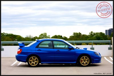 Side Shot Subaru STi 2006 Gold Wheels